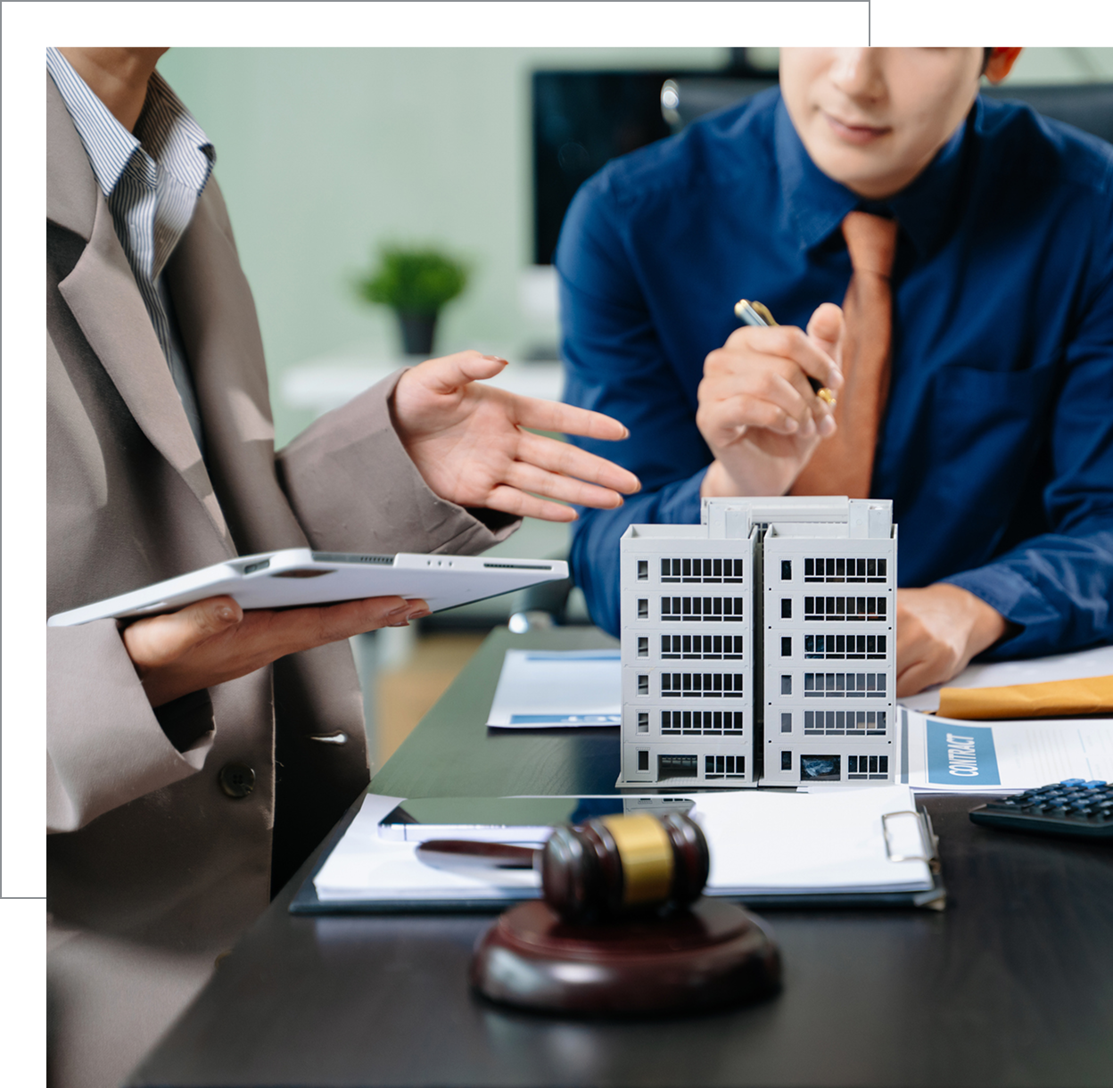 Professionals discussing building plans