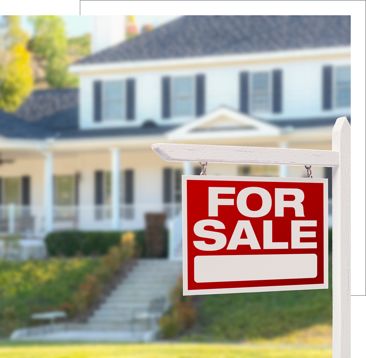 House with for sale sign