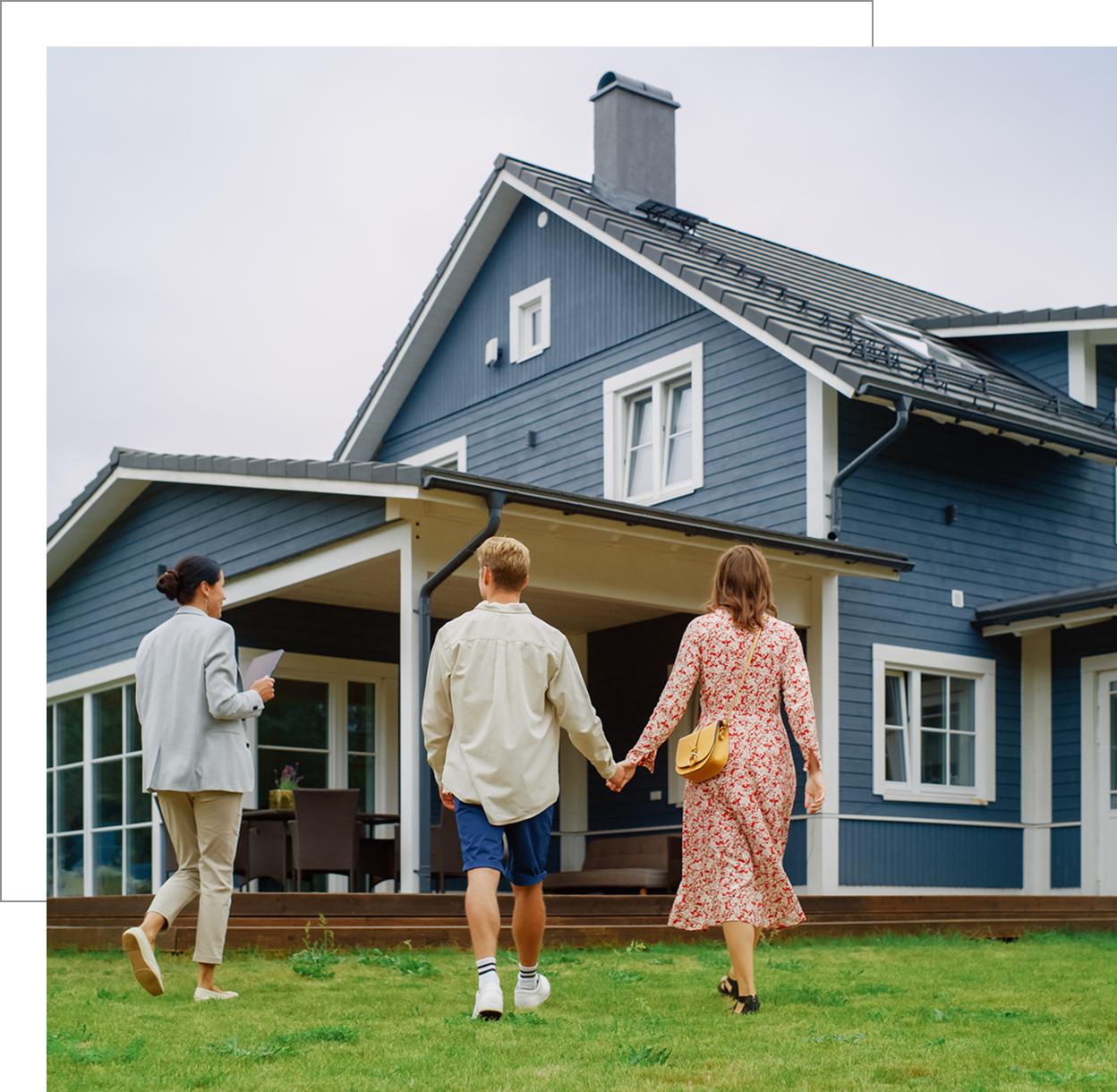 Couple approaching a modern home
