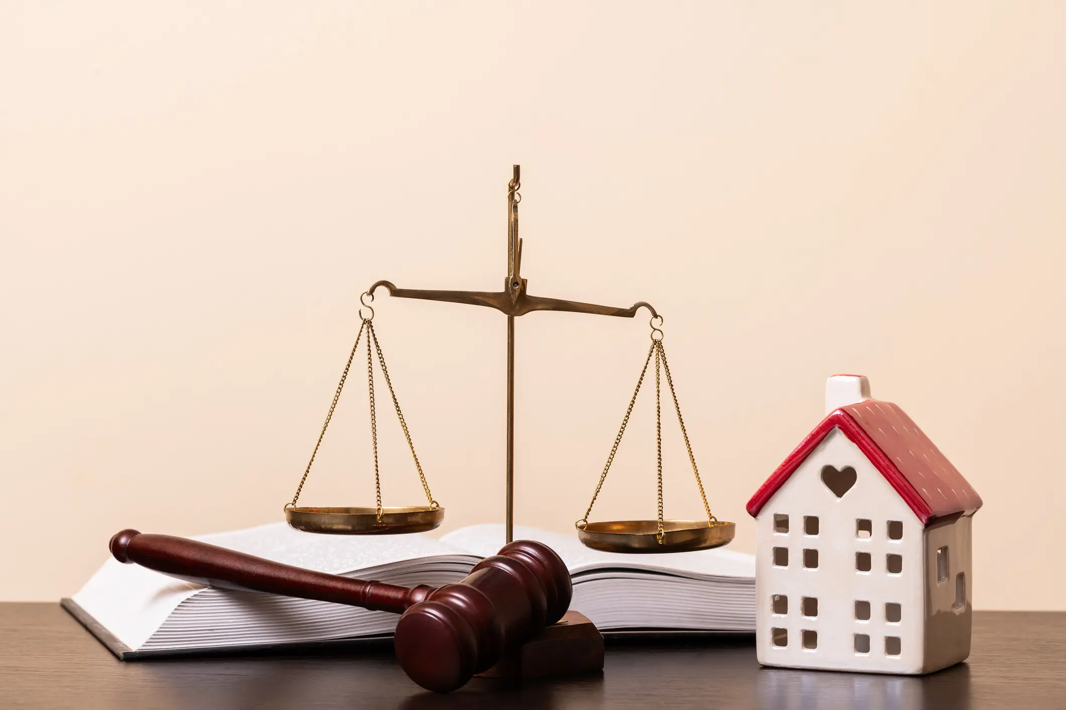 Legal concept with home and scales