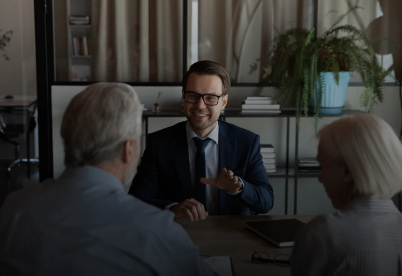 Professional discussion at office desk